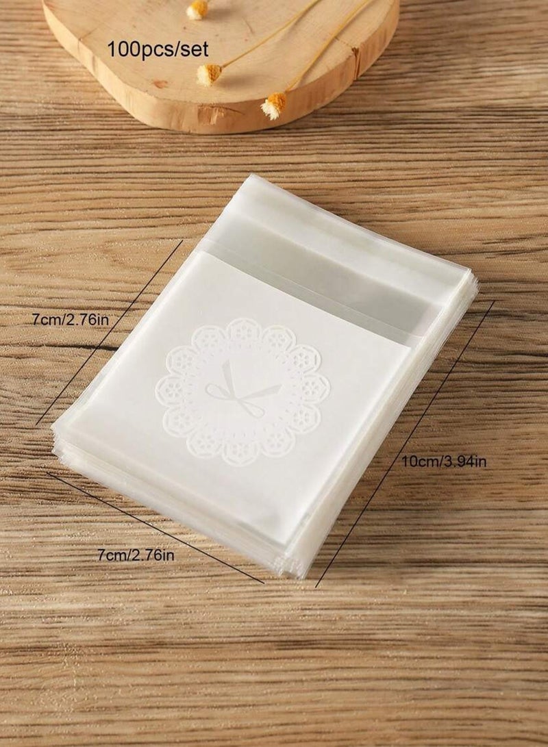 كوكنا أكياس تغليف حلويات، ذاتية اللصق بنمط فيونكة بيضاء، أكياس هدايا شفافة لعيد مبارك، أكياس صغيرة للبسكويت والشوكولاتة، 7x10 سم، 100 قطعة - Image 2